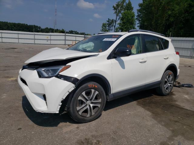 Photo 2 from auction – 2018 TOYOTA RAV4 LE with VIN JTMZFREV0JJ177402