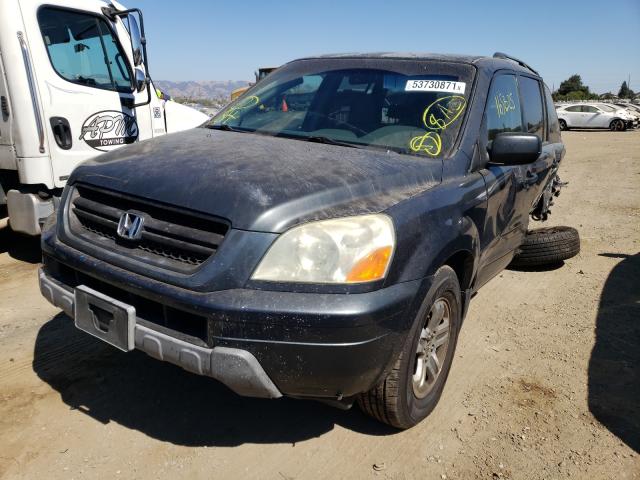 Photo 2 from auction – 2004 HONDA PILOT EX with VIN 2HKYF18484H515397