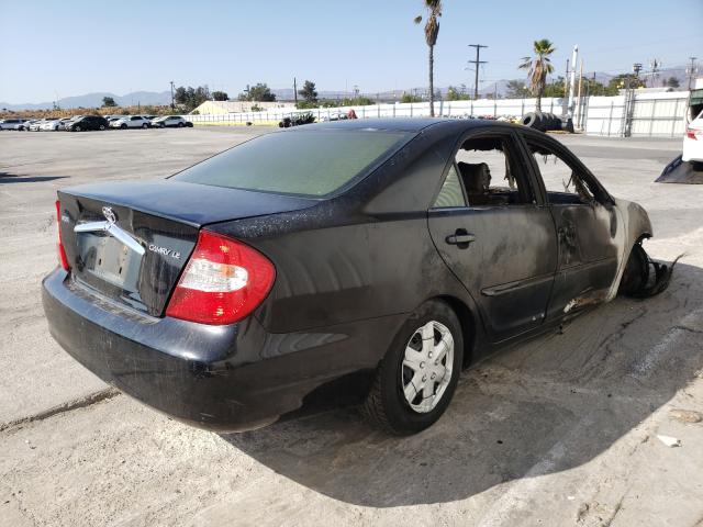 Photo 4 from auction – 2002 TOYOTA CAMRY LE with VIN JTDBE32K720022770