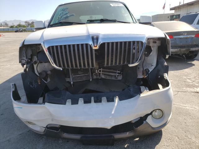 Photo 9 from auction – 2003 LINCOLN NAVIGATOR with VIN 5LMFU27R03LJ32931