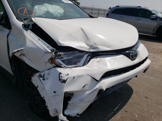 Photo 9 from auction – 2018 TOYOTA RAV4 LE with VIN JTMZFREV0JJ177402