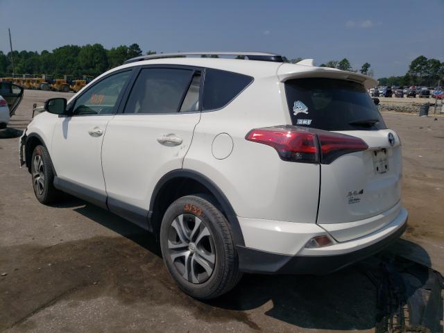 Photo 3 from auction – 2018 TOYOTA RAV4 LE with VIN JTMZFREV0JJ177402