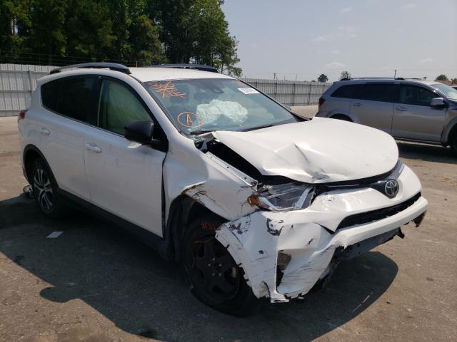 Photo 1 from auction – 2018 TOYOTA RAV4 LE with VIN JTMZFREV0JJ177402