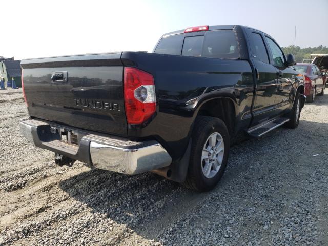 Photo 4 from auction – 2014 TOYOTA TUNDRA DOU with VIN 5TFRY5F18EX156850