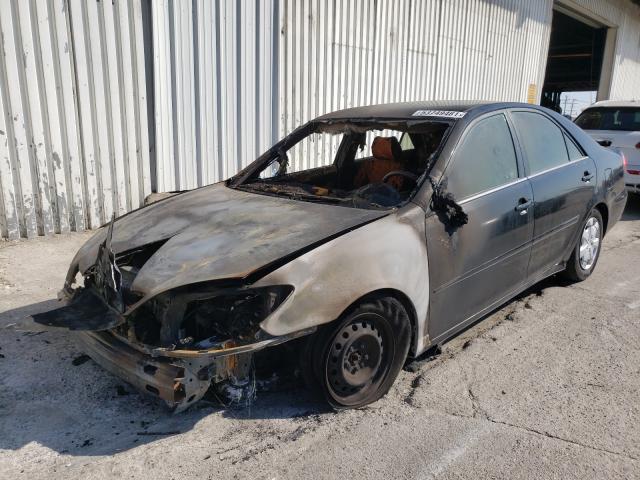 Photo 2 from auction – 2002 TOYOTA CAMRY LE with VIN JTDBE32K720022770
