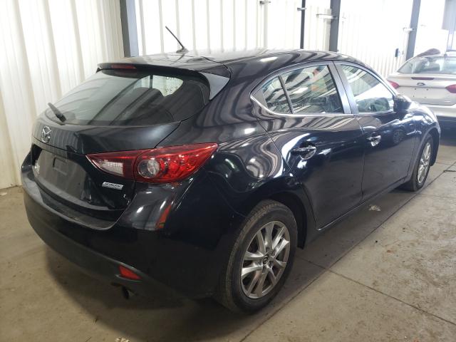 Photo 4 from auction – 2014 MAZDA 3 TOURING with VIN JM1BM1L74E1144938