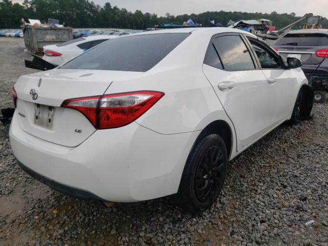 Photo 4 from auction – 2014 TOYOTA COROLLA L with VIN 5YFBURHEXEP021372