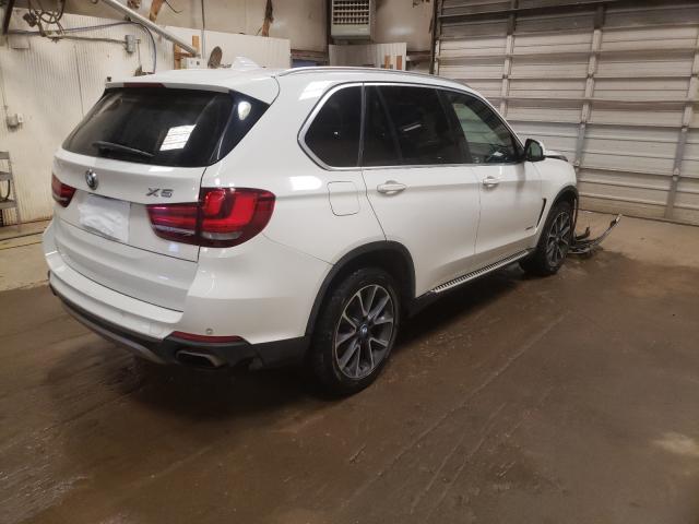 Photo 4 from auction – 2015 BMW X5 XDRIVE5 with VIN 5UXKR6C58F0J76830