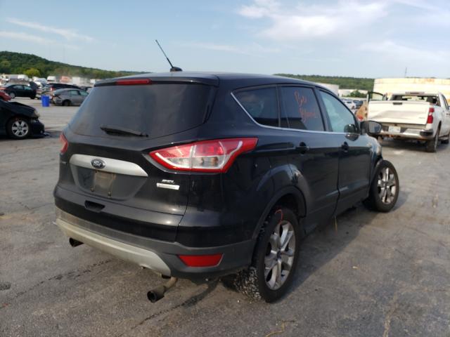 Photo 4 from auction – 2013 FORD ESCAPE SEL with VIN 1FMCU0HX4DUB82170