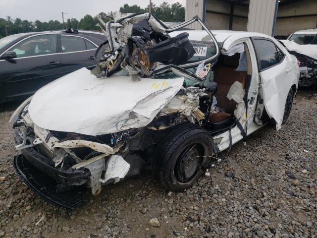 Photo 2 from auction – 2014 TOYOTA COROLLA L with VIN 5YFBURHEXEP021372