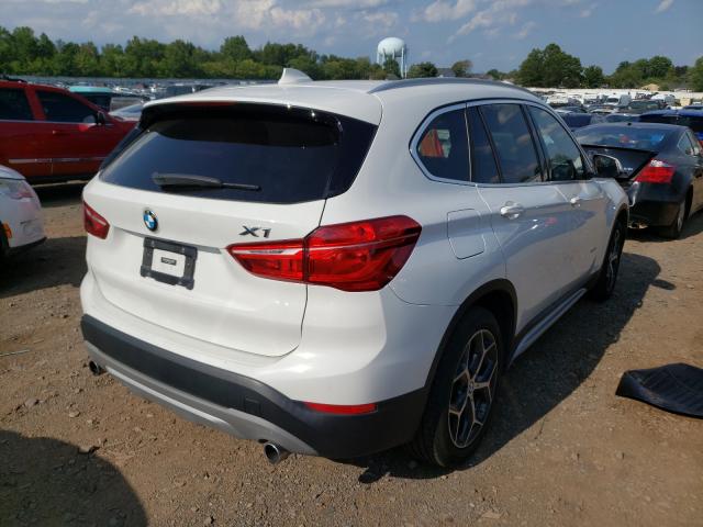 Photo 4 from auction – 2018 BMW X1 XDRIVE2 with VIN WBXHT3C32J5K21947