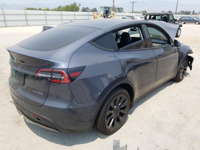 Photo 4 from auction – 2021 TESLA MODEL Y with VIN 5YJYGDEE5MF222843