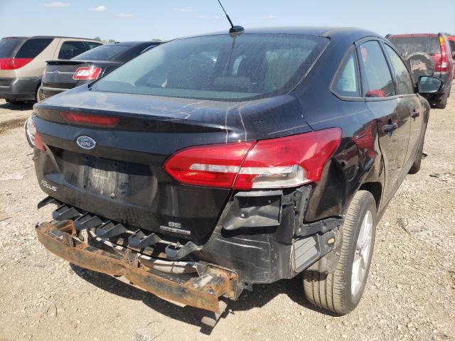 Photo 4 from auction – 2016 FORD FOCUS SE with VIN 1FADP3F26GL244421