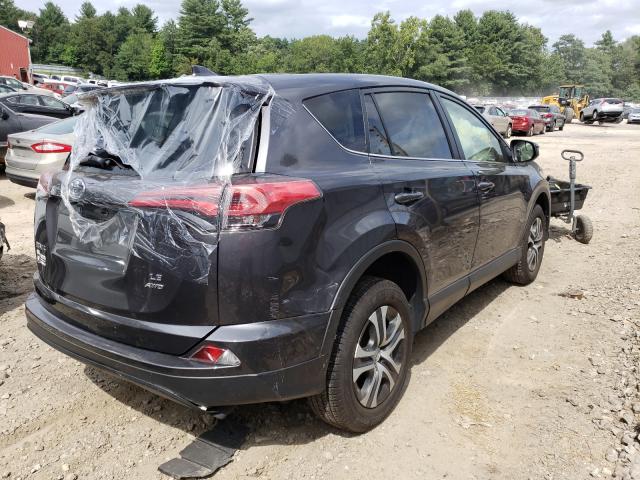 Photo 4 from auction – 2018 TOYOTA RAV4 LE with VIN JTMBFREVXJJ216272