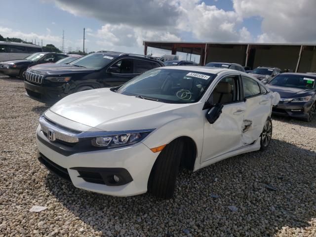 Photo 2 from auction – 2018 HONDA CIVIC EX with VIN JHMFC1F32JX025501