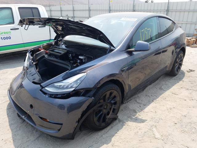 Photo 2 from auction – 2021 TESLA MODEL Y with VIN 5YJYGDEE5MF222843