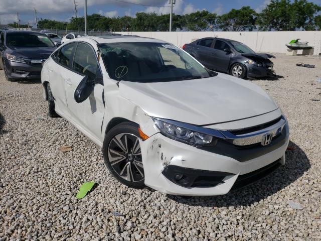 Photo 1 from auction – 2018 HONDA CIVIC EX with VIN JHMFC1F32JX025501