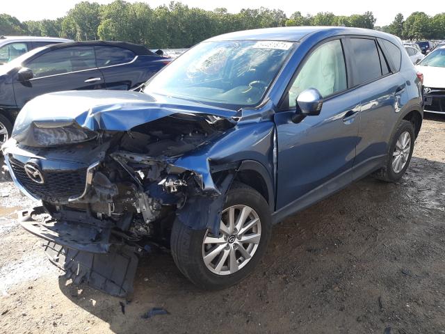 Photo 2 from auction – 2015 MAZDA CX-5 TOURI with VIN JM3KE2CYXF0464176