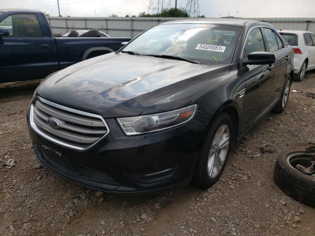 Photo 2 from auction – 2016 FORD TAURUS SEL with VIN 1FAHP2H82GG129143