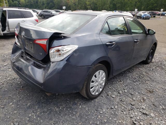 Photo 4 from auction – 2014 TOYOTA COROLLA L with VIN 5YFBURHE9EP128106