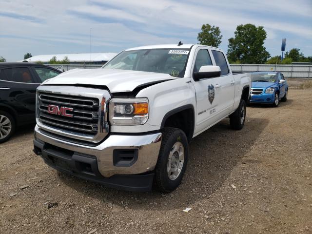 Photo 2 from auction – 2015 GMC SIERRA K25 with VIN 1GT12YEG3FF103079