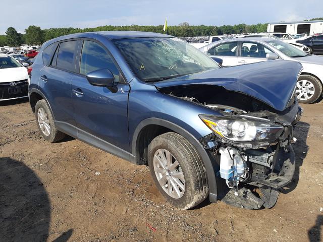 MAZDA CX-5 TOURI 2015 with VIN JM3KE2CYXF0464176 - Photo from auction
