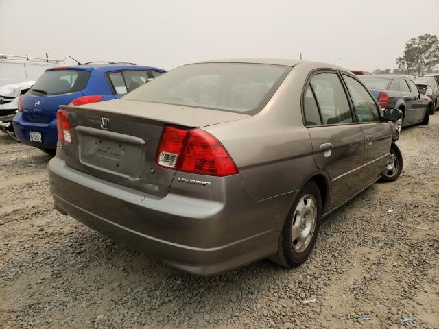 Photo 4 from auction – 2004 HONDA CIVIC HYBR with VIN JHMES95684S015629
