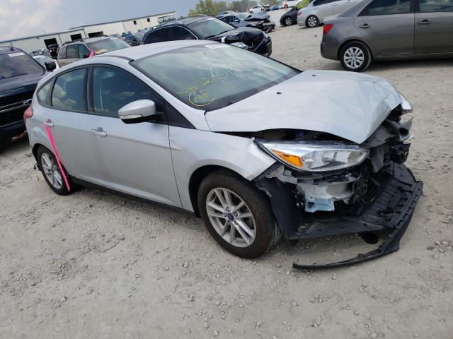 FORD FOCUS SE 2018 with VIN 1FADP3K22JL321217 - Photo from auction