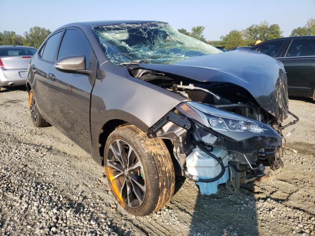 TOYOTA COROLLA L 2018 with VIN 5YFBURHE7JP803185 - Photo from auction
