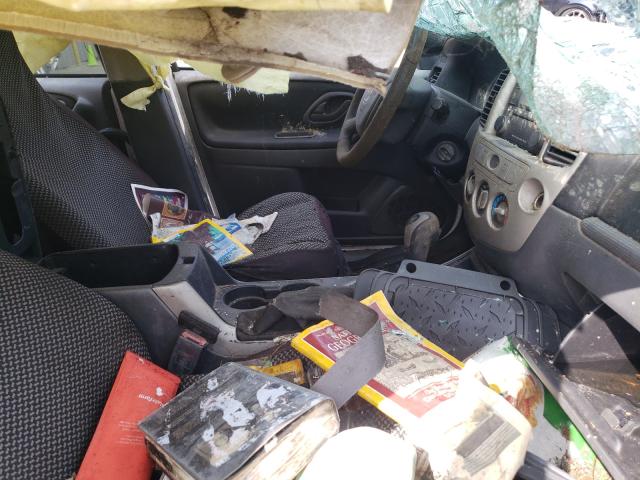 Photo 5 from auction – 2005 MAZDA TRIBUTE with VIN 4F2CZ04165KM60328