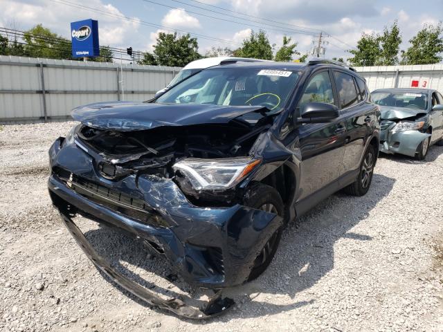 Photo 2 from auction – 2018 TOYOTA RAV4 LE with VIN 2T3ZFREV5JW459424