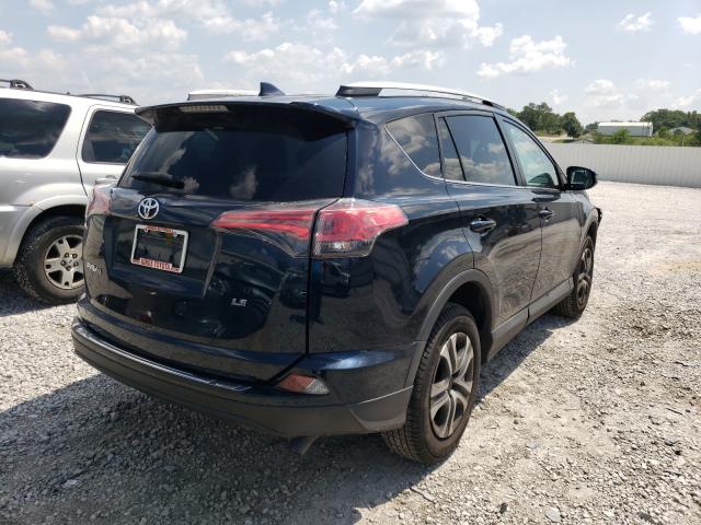 Photo 4 from auction – 2018 TOYOTA RAV4 LE with VIN 2T3ZFREV5JW459424
