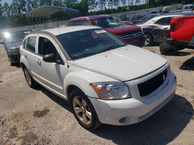 DODGE CALIBER MA 2011 with VIN 1B3CB3HA2BD269328 - Photo from auction