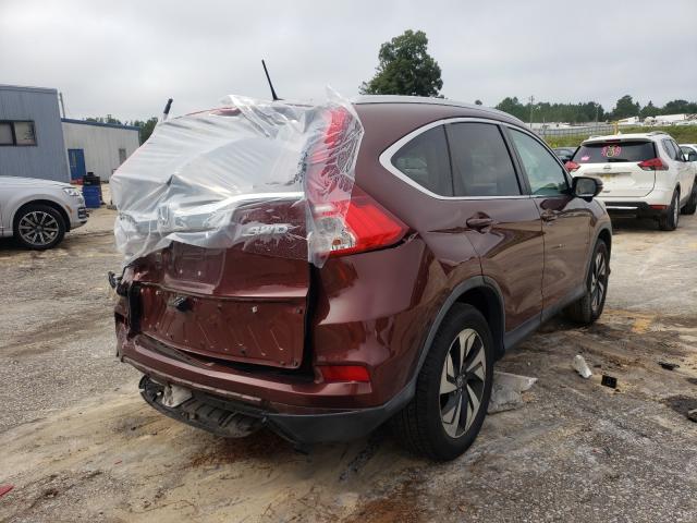 Photo 4 from auction – 2016 HONDA CR-V TOURI with VIN 5J6RM4H90GL054102