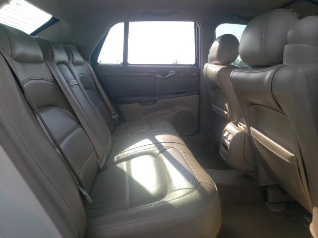 Photo 6 from auction – 2004 CADILLAC DEVILLE with VIN 1G6KD54YX4U219964