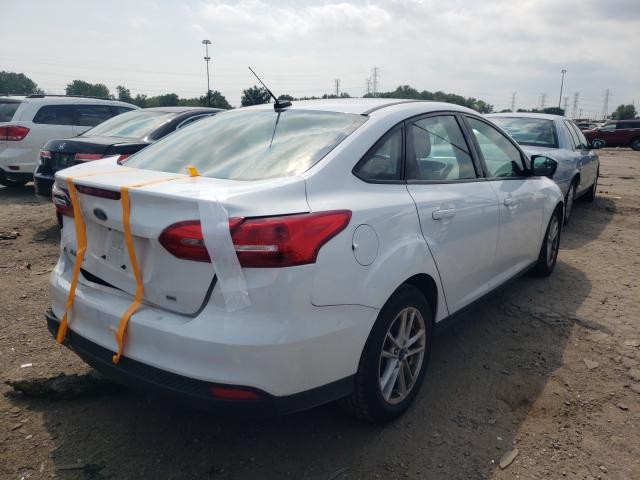 Photo 4 from auction – 2018 FORD FOCUS SE with VIN 1FADP3F29JL248955