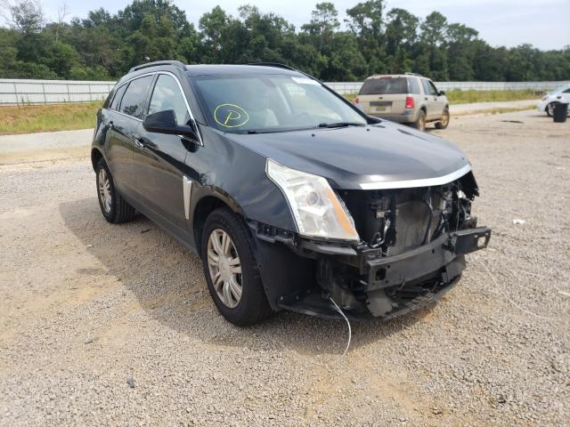 CADILLAC SRX 2014 with VIN 3GYFNAE3XES659251 - Photo from auction