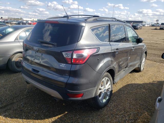 Photo 4 from auction – 2017 FORD ESCAPE SE with VIN 1FMCU9GD6HUE60357