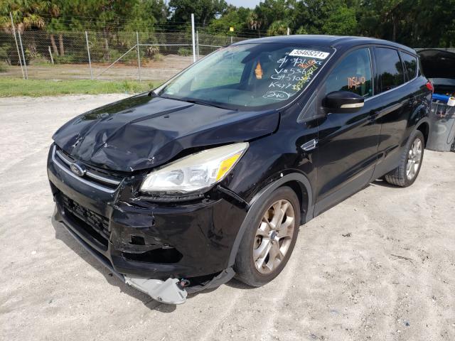 Photo 2 from auction – 2013 FORD ESCAPE SEL with VIN 1FMCU9H91DUB35362