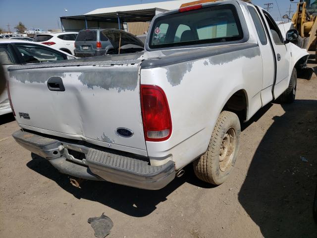 Photo 4 from auction – 1998 FORD F150 with VIN 1FTRX17LXWKB94722
