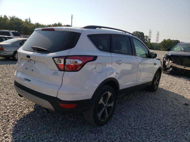 Photo 4 from auction – 2017 FORD ESCAPE SE with VIN 1FMCU0GD9HUD65609