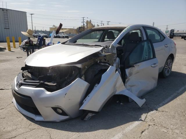 Photo 2 from auction – 2014 TOYOTA COROLLA L with VIN 5YFBURHEXEP140359