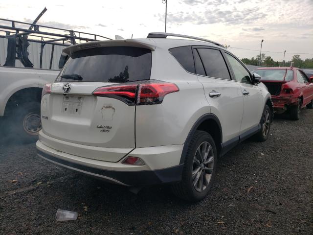 Photo 4 from auction – 2018 TOYOTA RAV4 LIMIT with VIN JTMDFREV6JJ206430