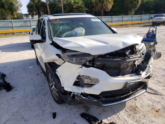 HONDA PILOT TOUR 2017 with VIN 5FNYF5H97HB019191 - Photo from auction