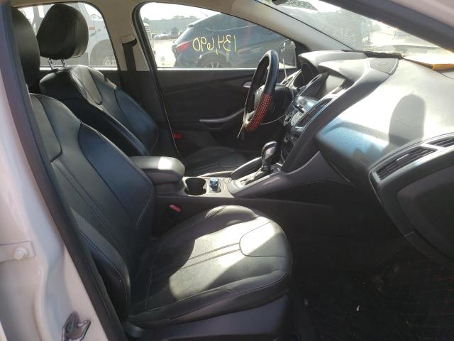 Photo 5 from auction – 2012 FORD FOCUS TITA with VIN 1FAHP3J22CL391807