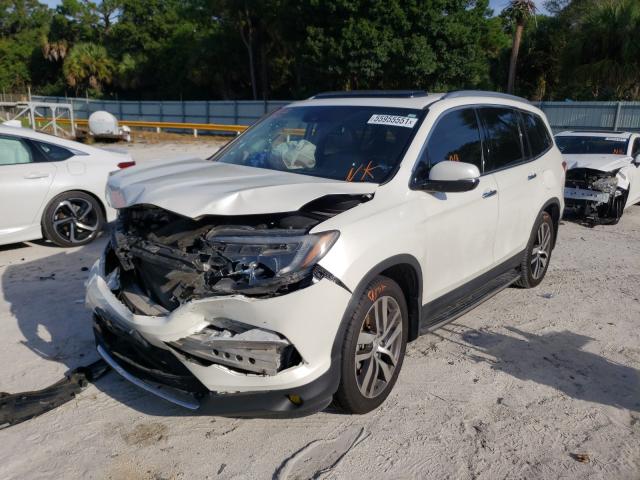Photo 2 from auction – 2017 HONDA PILOT TOUR with VIN 5FNYF5H97HB019191