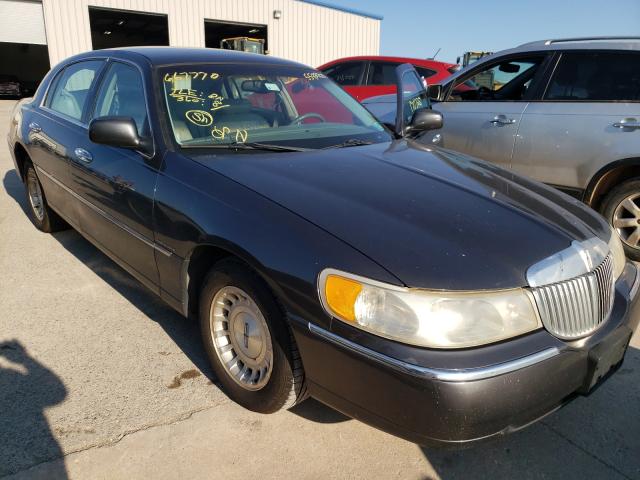 LINCOLN TOWN CAR E 1998 with VIN 1LNFM81W9WY667770 - Photo from auction