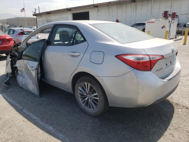Photo 3 from auction – 2014 TOYOTA COROLLA L with VIN 5YFBURHEXEP140359