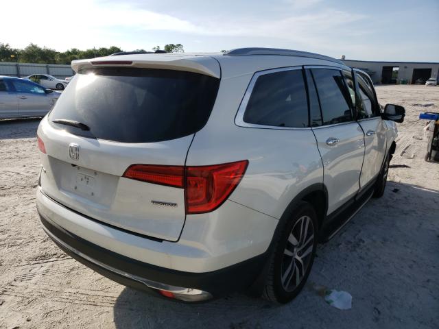 Photo 4 from auction – 2017 HONDA PILOT TOUR with VIN 5FNYF5H97HB019191