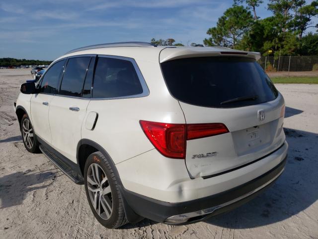 Photo 3 from auction – 2017 HONDA PILOT TOUR with VIN 5FNYF5H97HB019191